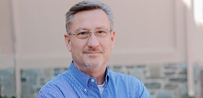 NPA President and CEO Shawn Bloom standing outside