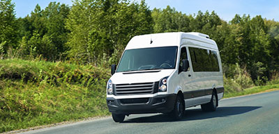 Shuttle bus on a rural road